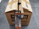 a cardboard box with a pair of scissors in it