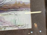 a picture of a painting of a river in a frame