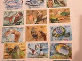 a picture of a collection of stamps with animals on them