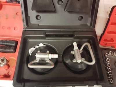 a box with a couple of tools inside of it