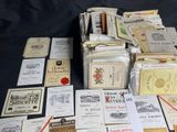 many different types of wine labels laid out on a table