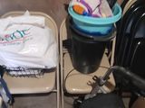 many items that are sitting on a cart in the room