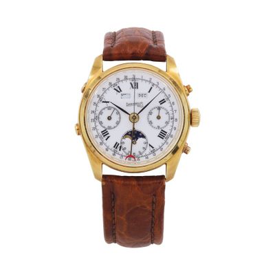 a close up of a watch on a white background
