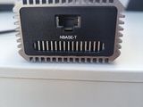 an image of a close up of a small device on a table