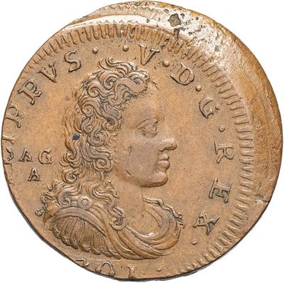 a close up of a coin with a woman ' s face on it