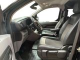 a view of the inside of a truck with the driver ' s seat up