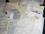 several papers are piled on top of each other on a table