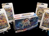 three packs of pokemon trading cards are on a black background