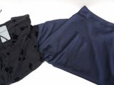 a pair of pants and a pair of glasses on a table