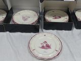 several plates and bowls are sitting on a table in a box