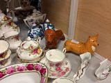 a table with a lot of china on it