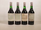 trois bouteilles de vin posées l'une à côté de l'autre sur une table