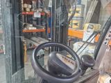 a picture of a forklift driver in a warehouse