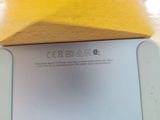 a close up of a cell phone on a table