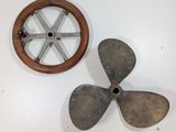 a propeller and a wheel on the wall