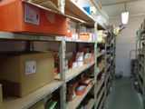 many boxes and boxes on the shelves in the warehouse