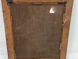 an old wooden picture frame with a glass window on a white surface
