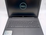 the dell laptop is open and ready to be used