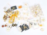 a lot of jewelry that is sitting on a white surface