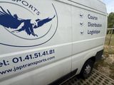 a van that is parked on the side of the road
