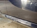 a close up of a car ' s door handle and door handle