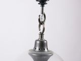 a light that is hanging from the ceiling in the room