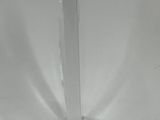 a clear acrylic candle holder on a white background