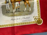 une banderole sur laquelle figurent un jockey et un cheval