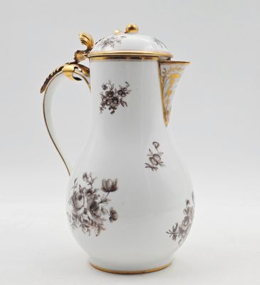 an image of a white and gold coffee pot
