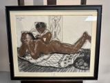 dessin encadré représentant une femme allongée sur un lit avec un chien