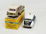 a toy car and a toy truck sitting on top of a box