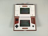 a small electronic game that is on the wall