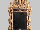 a mirror that is sitting on the wall