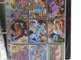 a picture of a binder with a bunch of comics on it