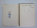 an open book with a picture of a man and a woman on it