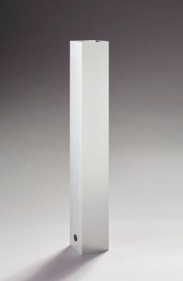an image of a tall white object on a table