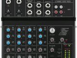 the mixer is shown with buttons and knobs on it
