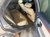 a picture of the inside of a car with the door open