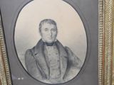 an old picture of a man in a suit and bow tie