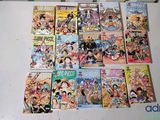a lot of comic books on the table