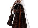 brown and white alligator skin handbag on white background