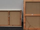 four wooden frames are lined up against a wall in a room