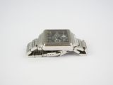 a watch that is sitting on a white surface