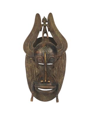 an image of a wooden mask on a white background