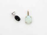 une paire de boucles d'oreilles en oplite et diamants