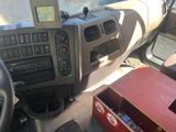 a picture of a car dashboard with a computer on it