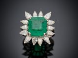 an emerald and diamond ring