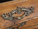 a close up of a drawer with a handle on it