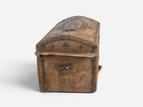 a small wooden box with a lid on a white surface