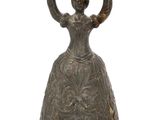 statue of a woman holding a bowl on her head